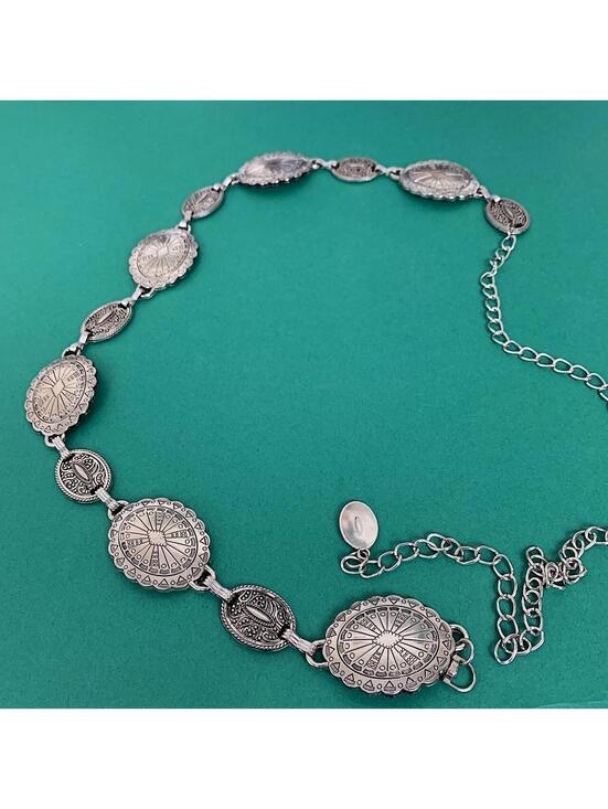 Accessories - Silver western belt with silver buckle and metal sun and moon charms. Fits most